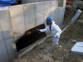 Application of J-Cote 
Waterproofing to a foundation